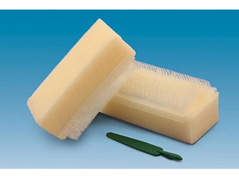 Disposable sterile sponge-brush with nail pick