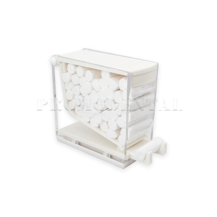 Distributeur de rouleaux de coton