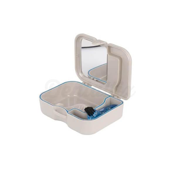Boîtier pour prothèses dentaires avec brosse et miroir